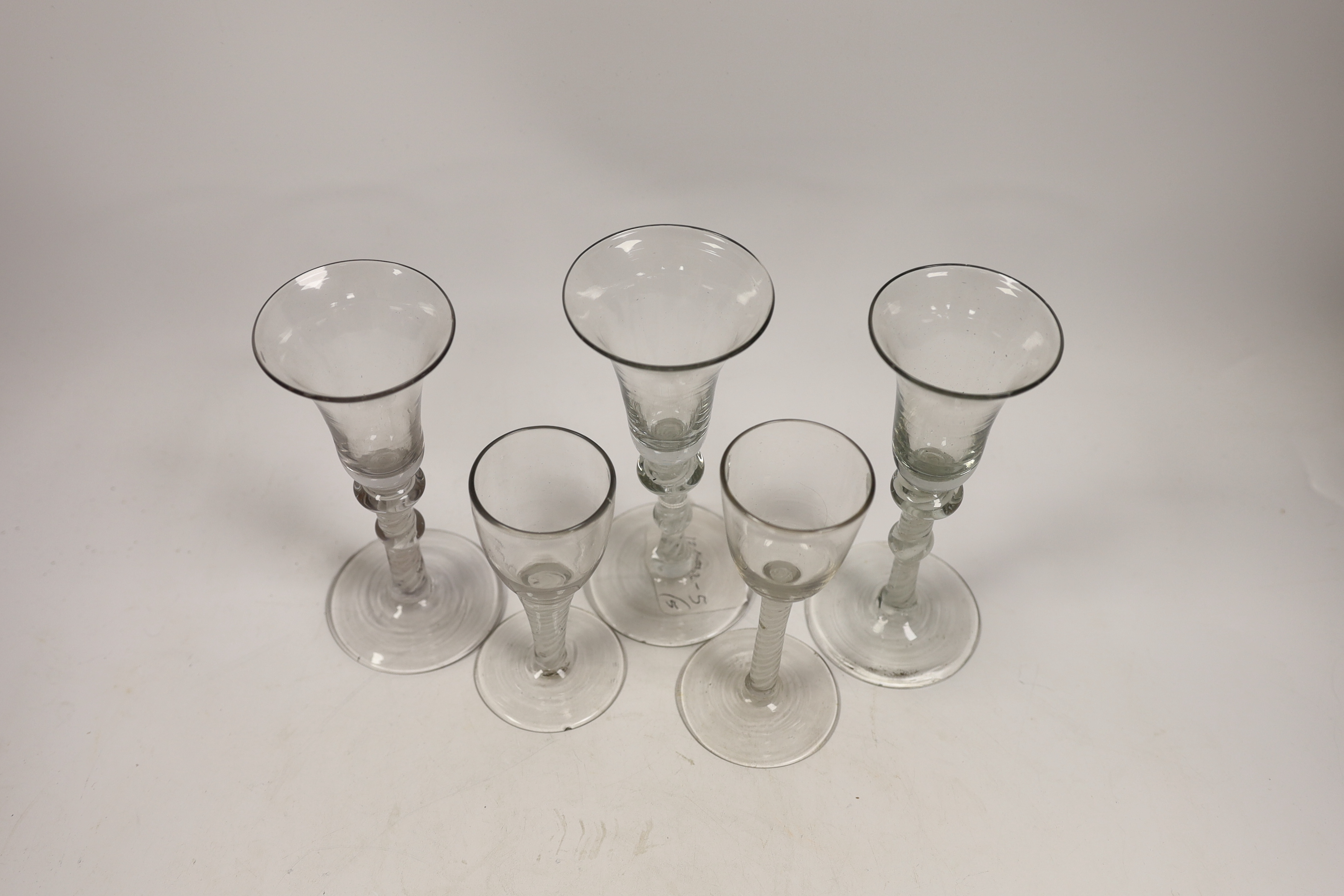 Five 19th century Dutch DSOT stem soda wine glasses, largest 17cm high